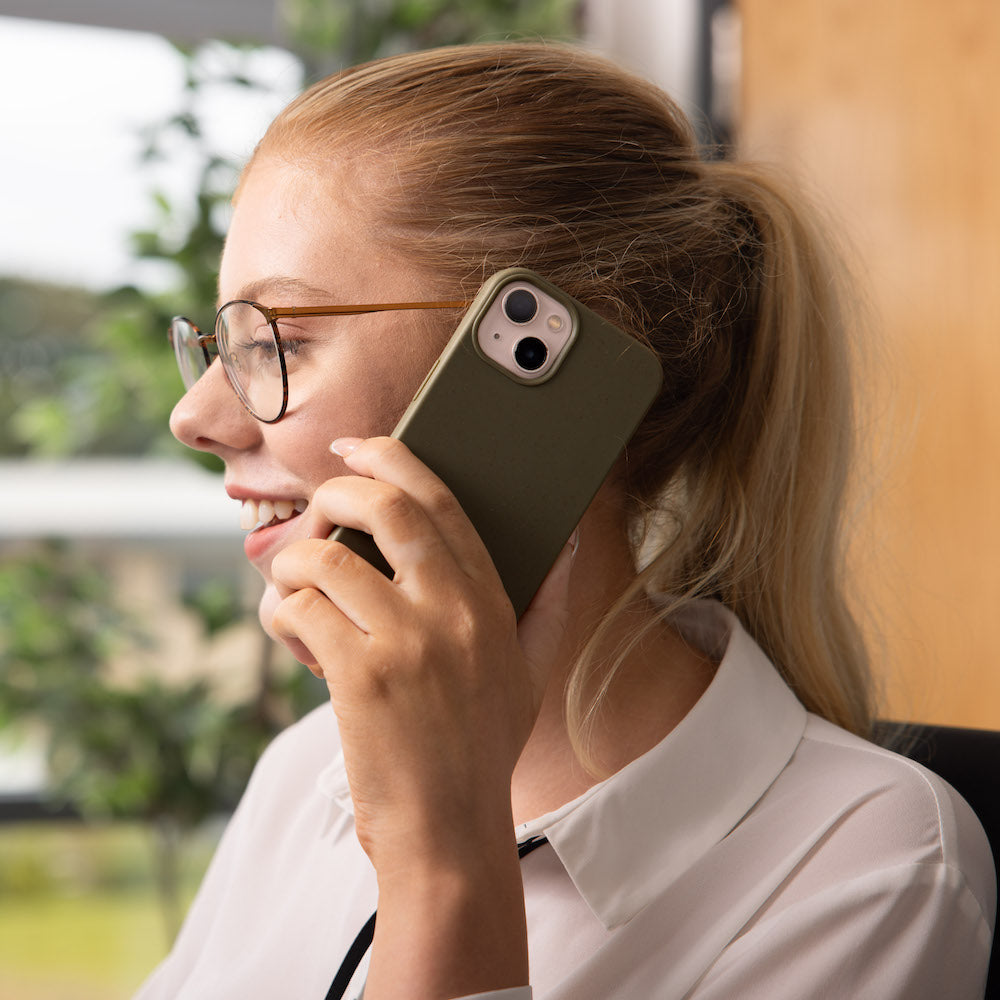 Lady holding her phone to her ear