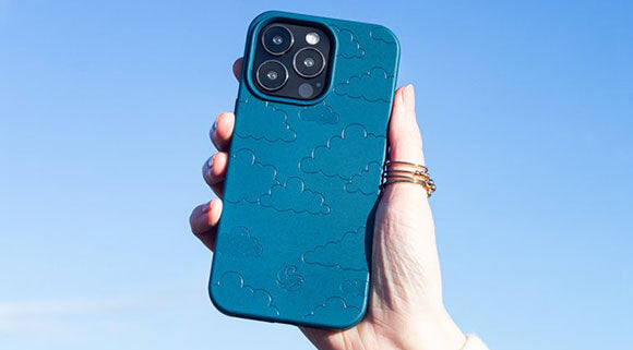 The back of a Wave Case phone case on a smartphone being held in the air