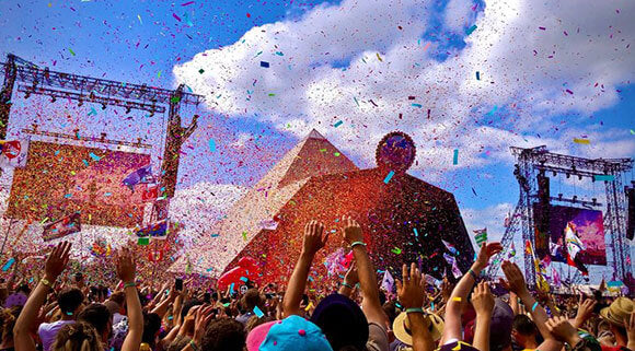 Festival crowd cheering in front of main stage
