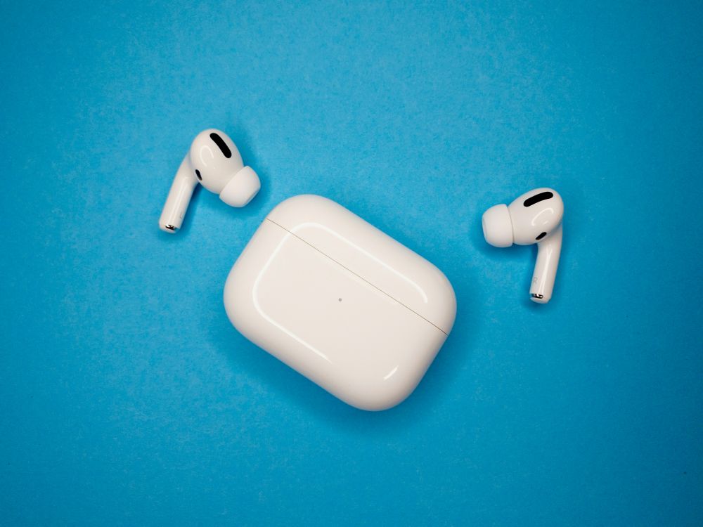 clean airpods on blue background